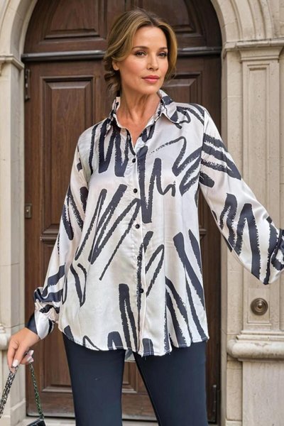 قميص تونك طويل بأكمام منفوخة بلون بيج