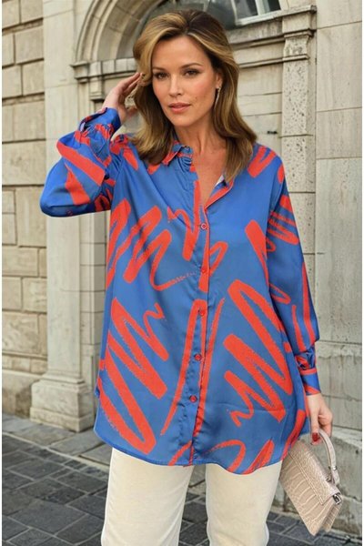 قميص طويل بأكمام منفوخة بلون النيلي