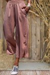 بنطلون برمودا كابري واسع بخصر مطاطي وجيوب وشقوق في الأطراف لون بوردو
