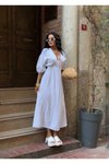 Beyaz Uzun Müslin Keten Dokulu Beli Büzgülü Bağlamalı V Yaka Elbise