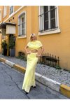 Sarı Uzun Büzgülü Etekli Göbeği Açık Dekolteli Tül Abiye Elbise