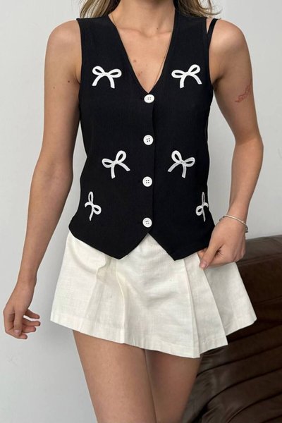 صدرية قماش العثماني مطرزة بشريط أسود